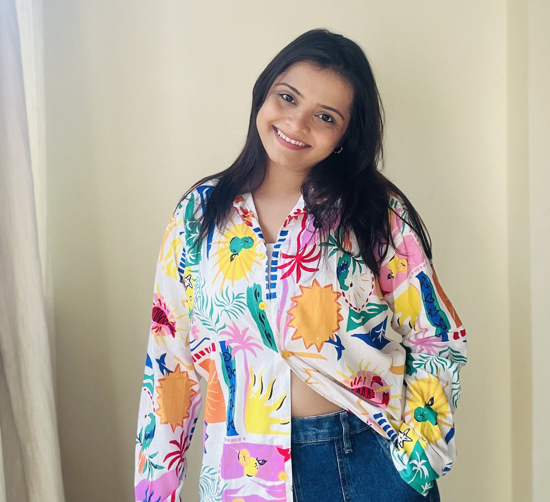 Founder of Swadesi stories slaying the look by wearing Gulmohar oversized shirt.